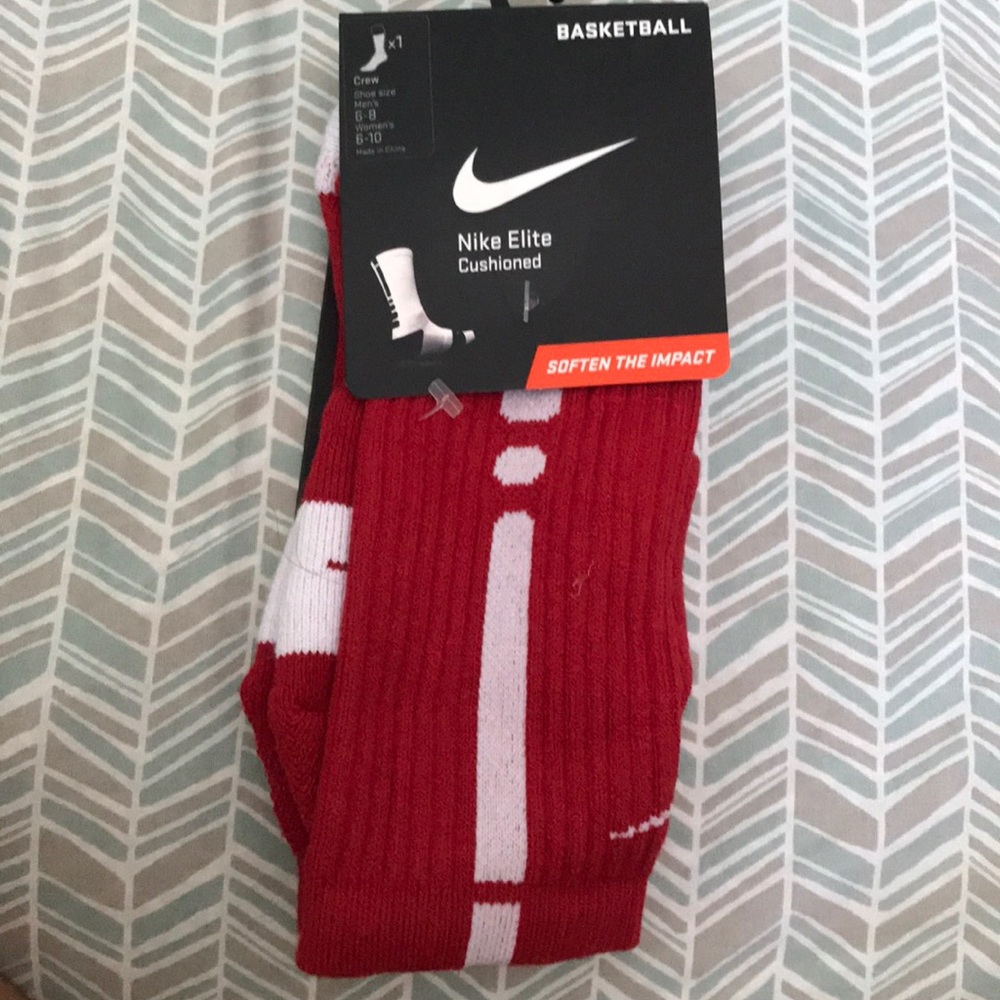 Red Nike elite dri-fit socks.